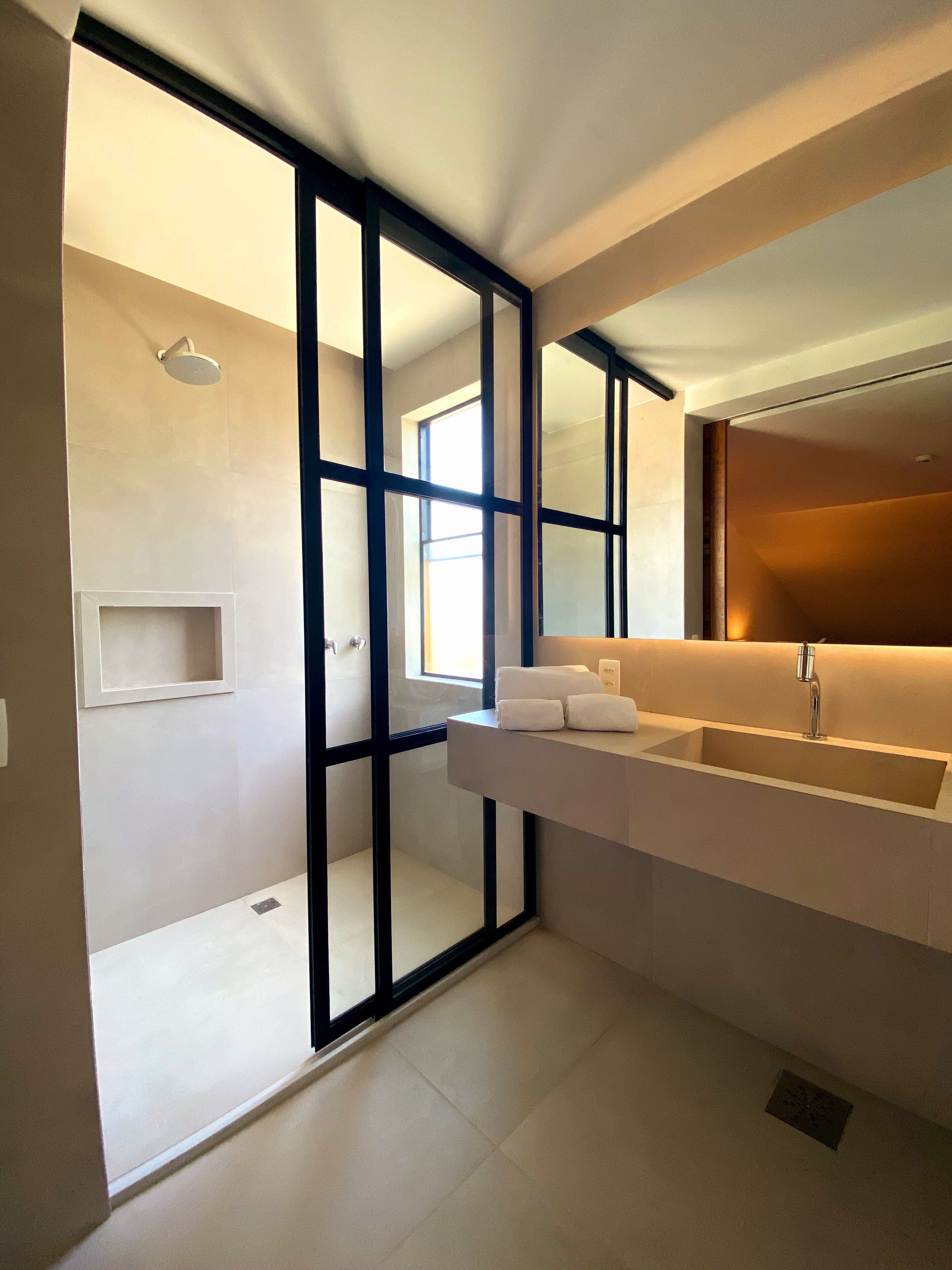 designer toiletries, hair dryer, bathrobes, slippers