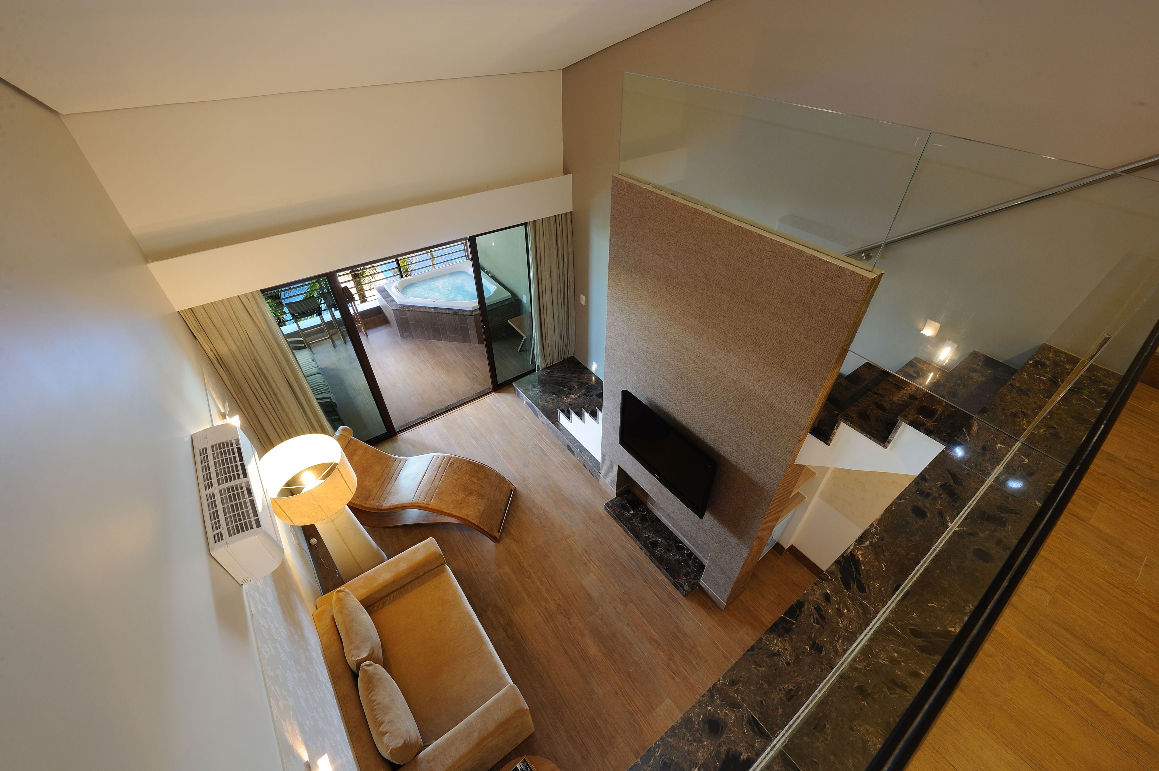 loft, hot tub | premium bedding, minibar, in-room safe, blackout curtains