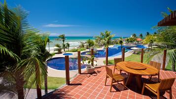 Outdoor pool, pool umbrellas, sun loungers