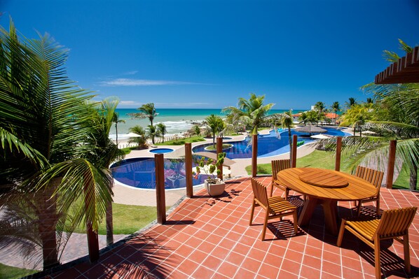 Outdoor pool, pool umbrellas, sun loungers