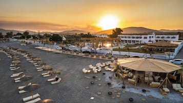 Private beach, free beach shuttle, beach cabanas, sun loungers