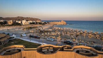 Private beach, free beach shuttle, beach cabanas, sun loungers