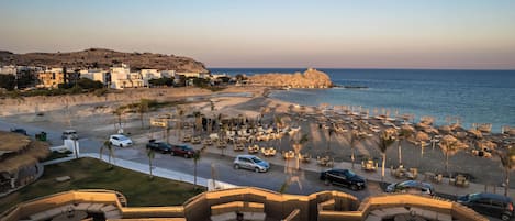 Private beach, free beach shuttle, beach cabanas, sun loungers