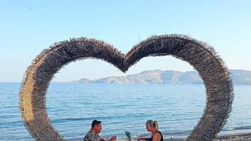 Private beach, free beach shuttle, beach cabanas, sun-loungers