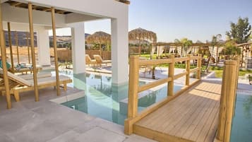 5 piscine all'aperto, cabanas (a pagamento), ombrelloni da piscina