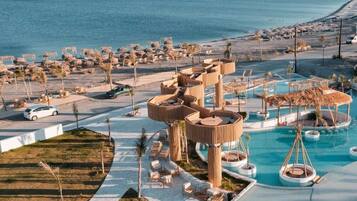 5 AuĂenpools, Cabañas (gegen GebĂŒhr), Sonnenschirme