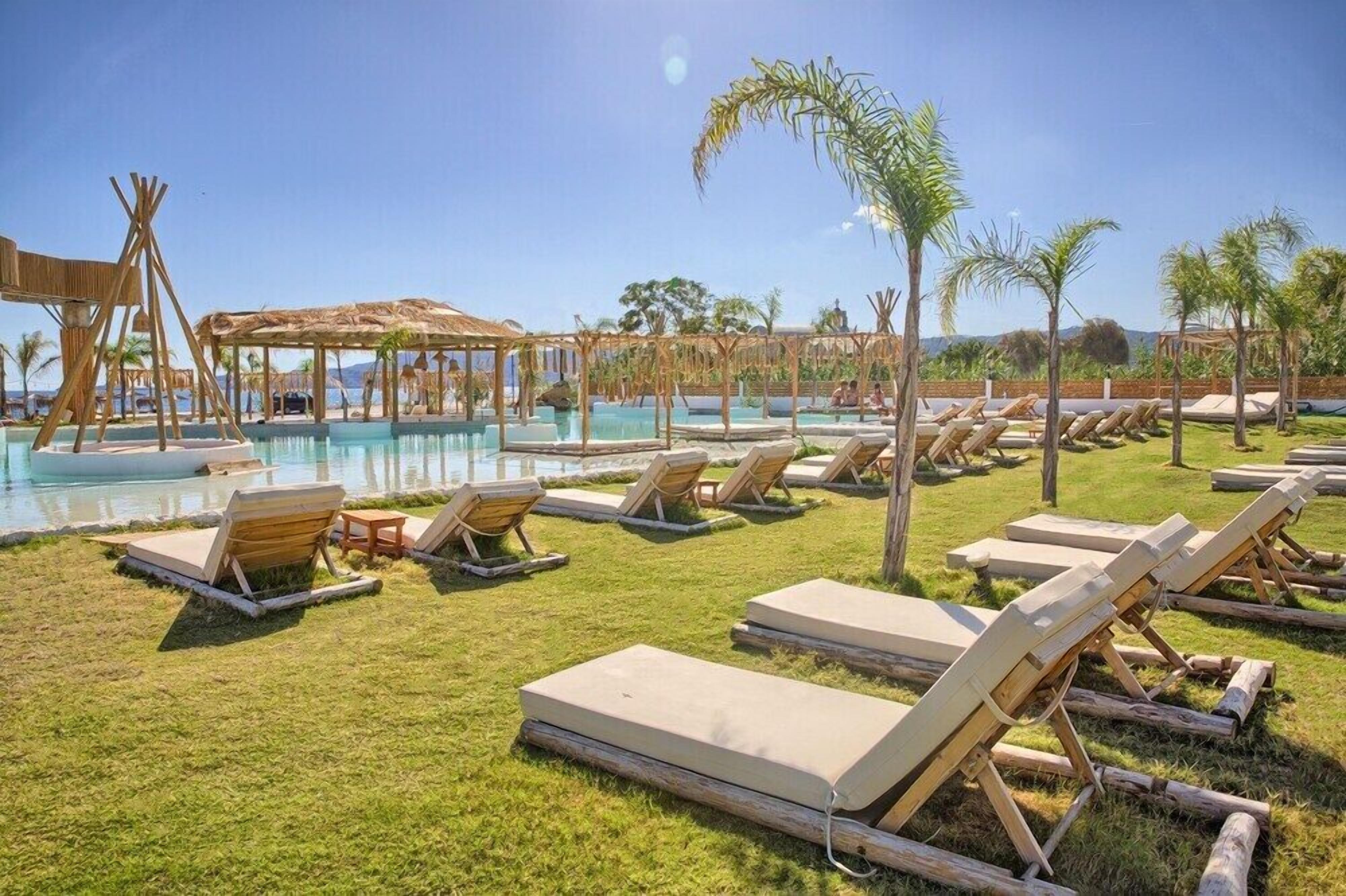 5 outdoor pools, cabanas (surcharge), pool umbrellas
