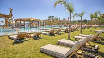 5 outdoor pools, cabanas (surcharge), pool umbrellas