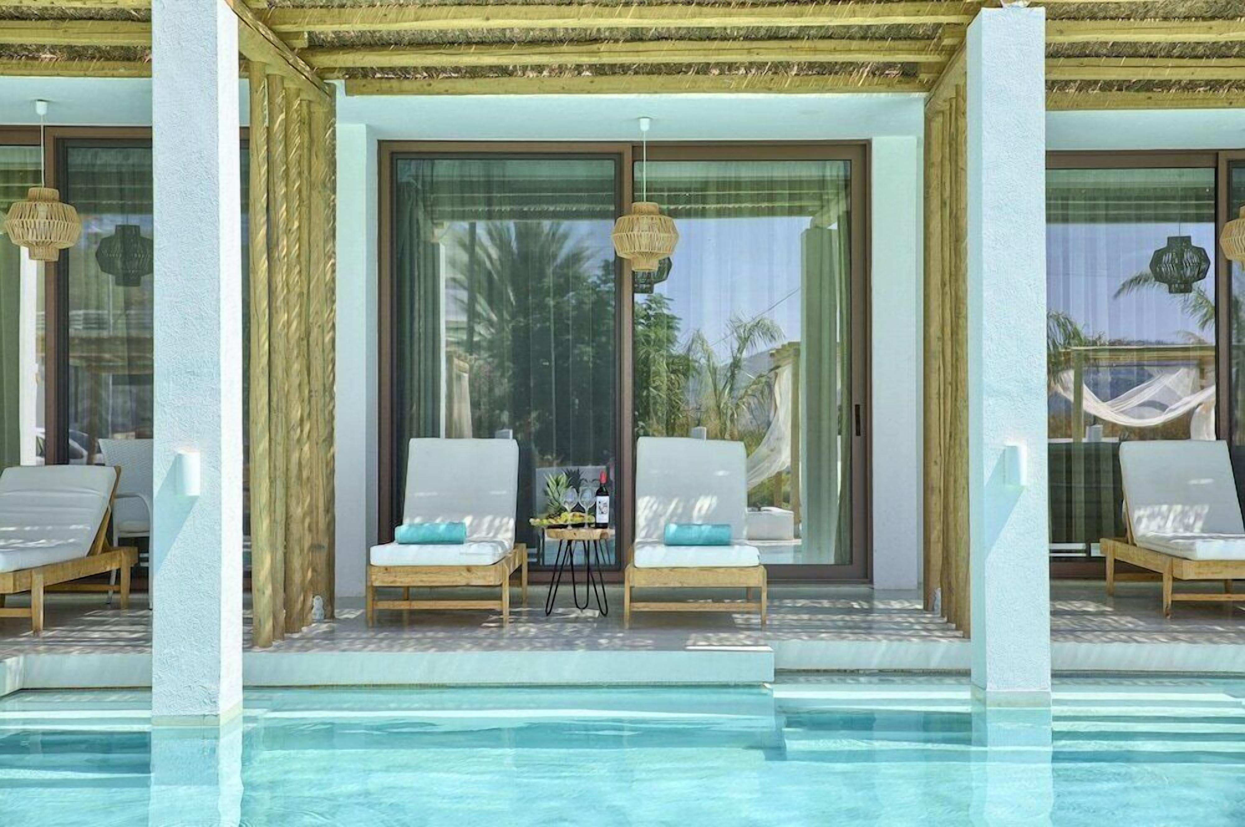 5 outdoor pools, cabanas (surcharge), pool umbrellas