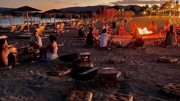 Private beach, free beach shuttle, beach cabanas, sun loungers