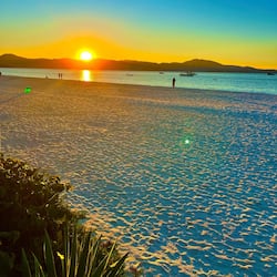 On the beach, white sand, free beach cabanas, sun loungers