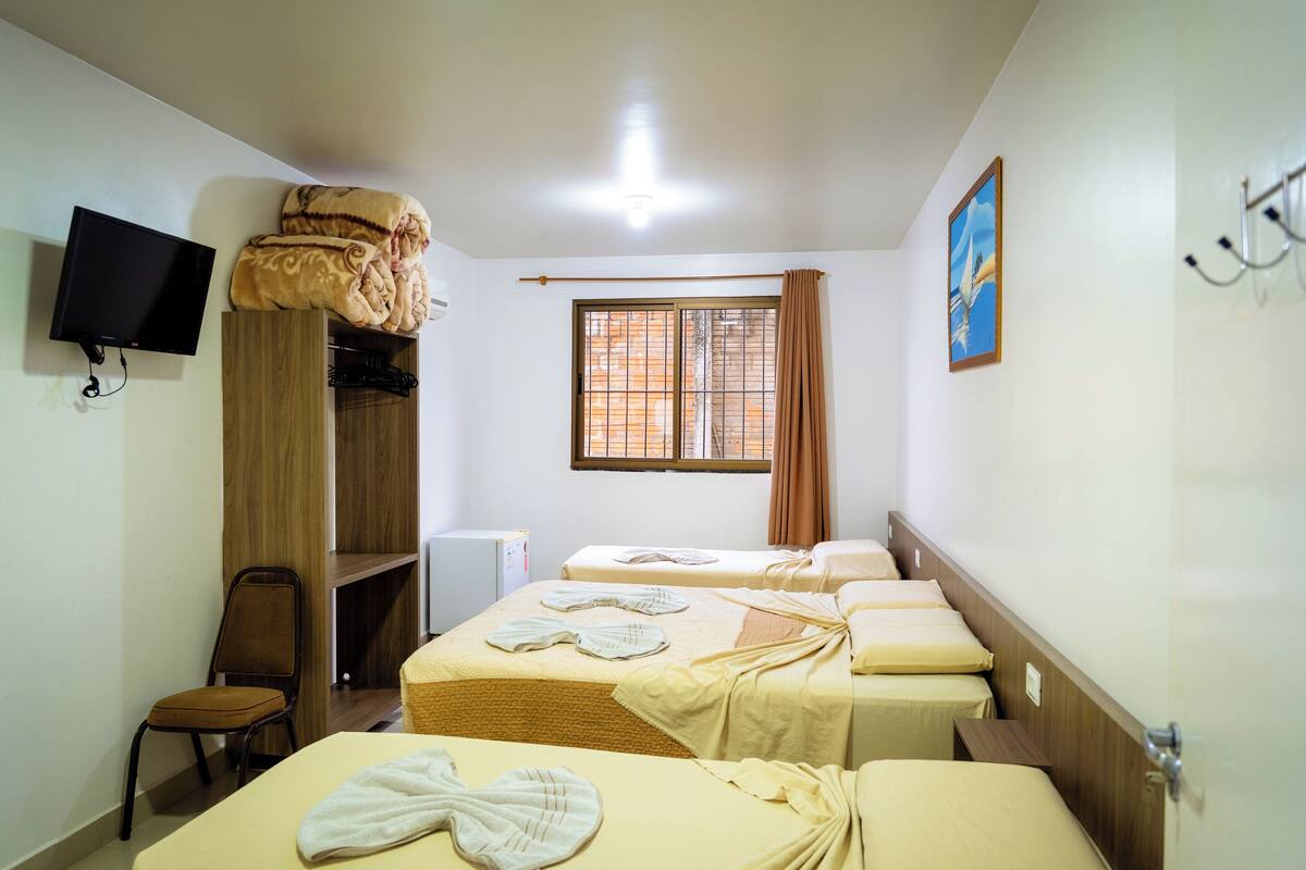 Economy Quadruple Room | In-room safe, desk, blackout curtains, free WiFi