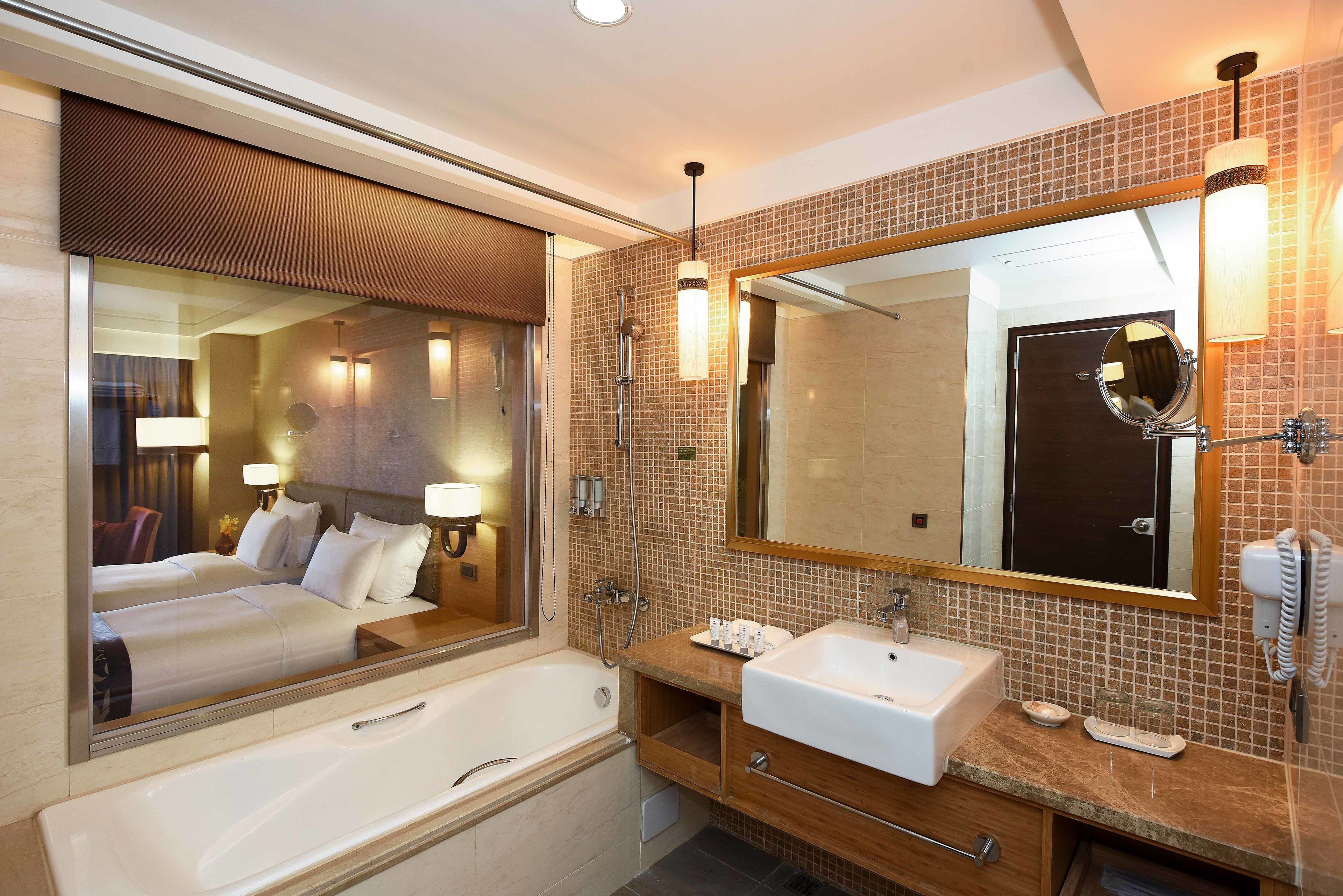 superior double room (sea view) | bathroom | shower, hair dryer, slippers, towels