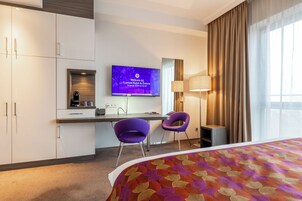 Ropa de cama de alta calidad y minibar 