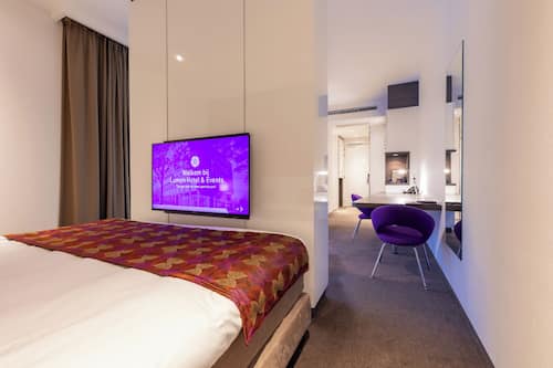 Habitació doble empresarial | Roba de llit d'alta qualitat, minibar i caixa forta a l'habitació