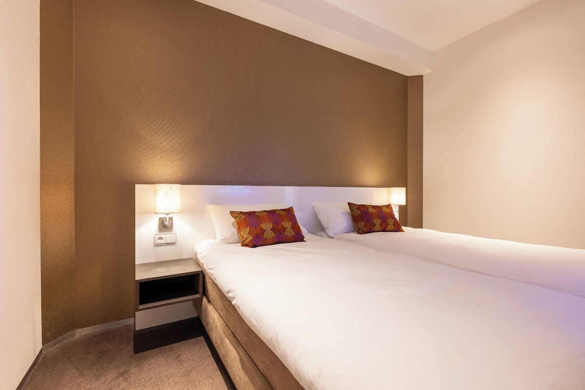 Habitació amb dos llits individuals empresarial | 1 dormitori, roba de llit d'alta qualitat i minibar