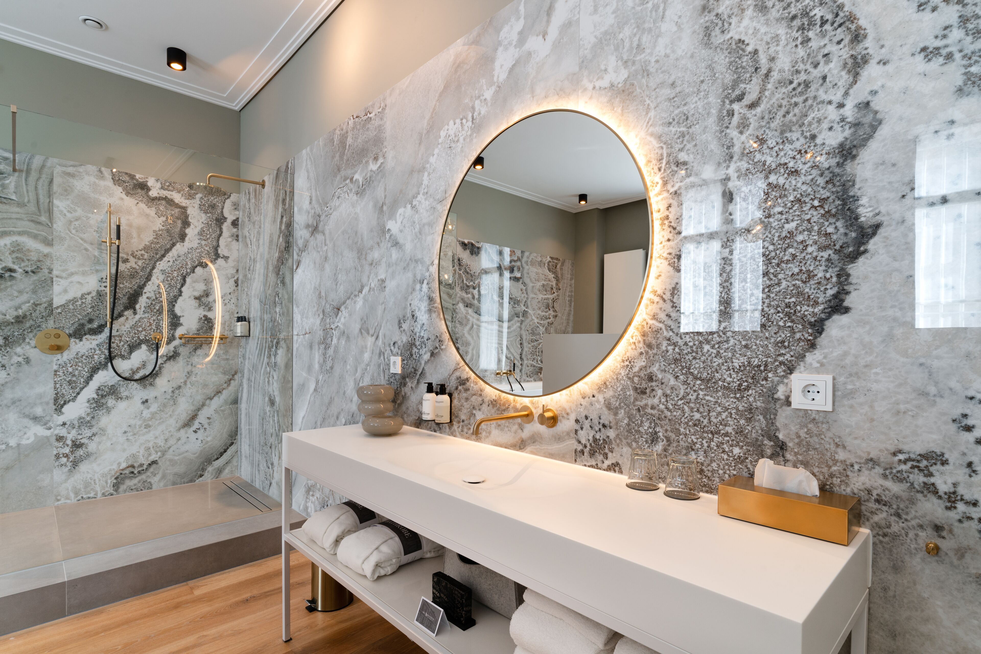 grand suite | bathroom | rainfall showerhead, free toiletries, hair dryer, bathrobes