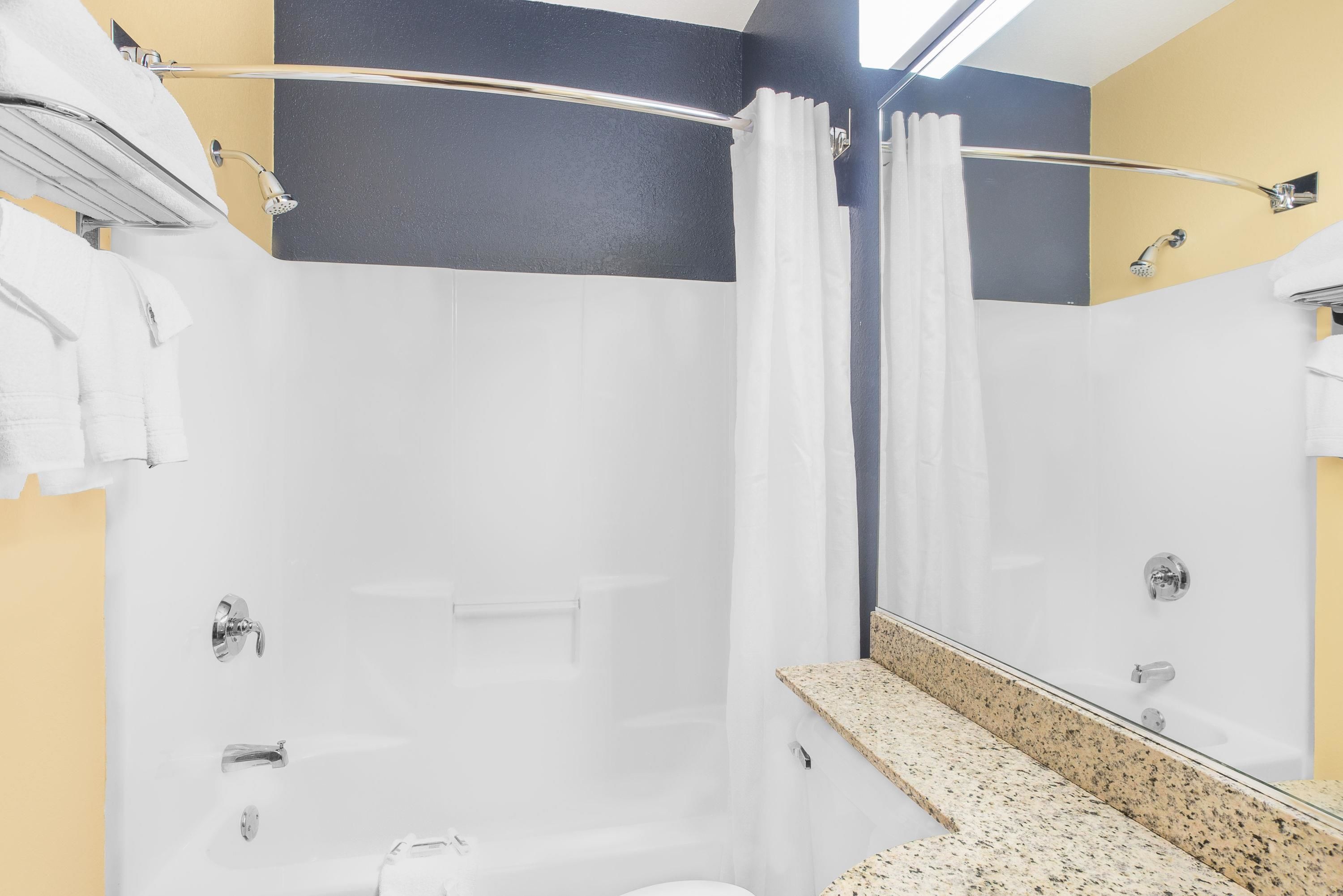 combined shower/bathtub, free toiletries, hair dryer, towels