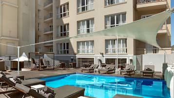 Outdoor pool, open 8:00 AM to 8:00 PM, free pool cabanas, pool umbrellas