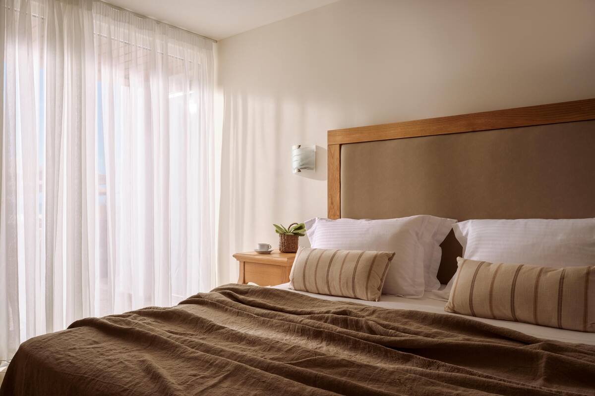 Premium Junior Suite Waterfront View, Ground floor | 1 bedroom, premium bedding, minibar (some free items), desk