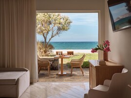 Premium Bungalow, Beach View | 1 bedroom, premium bedding, free minibar items, desk