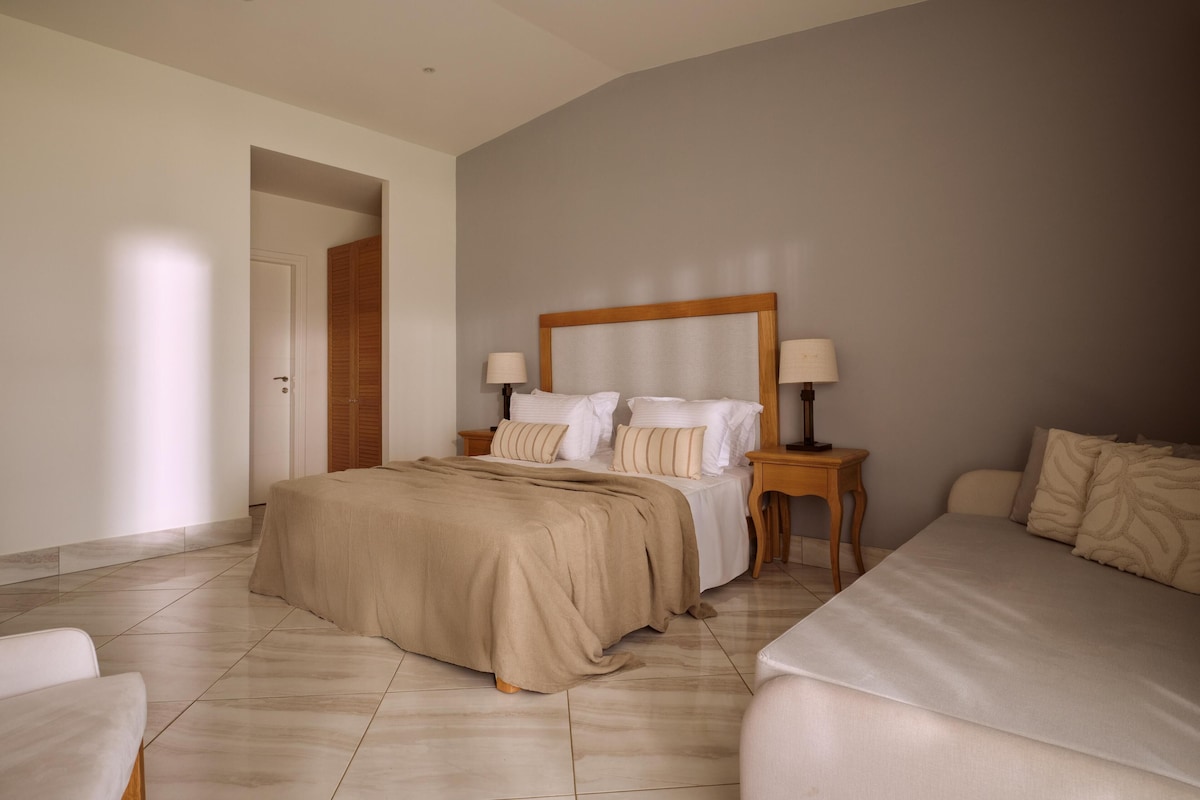 Premium Bungalow, Beach View | 1 bedroom, premium bedding, minibar (some free items), desk