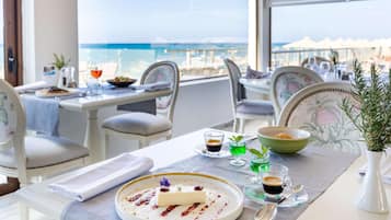 Breakfast, lunch served; local and international cuisine, beach views