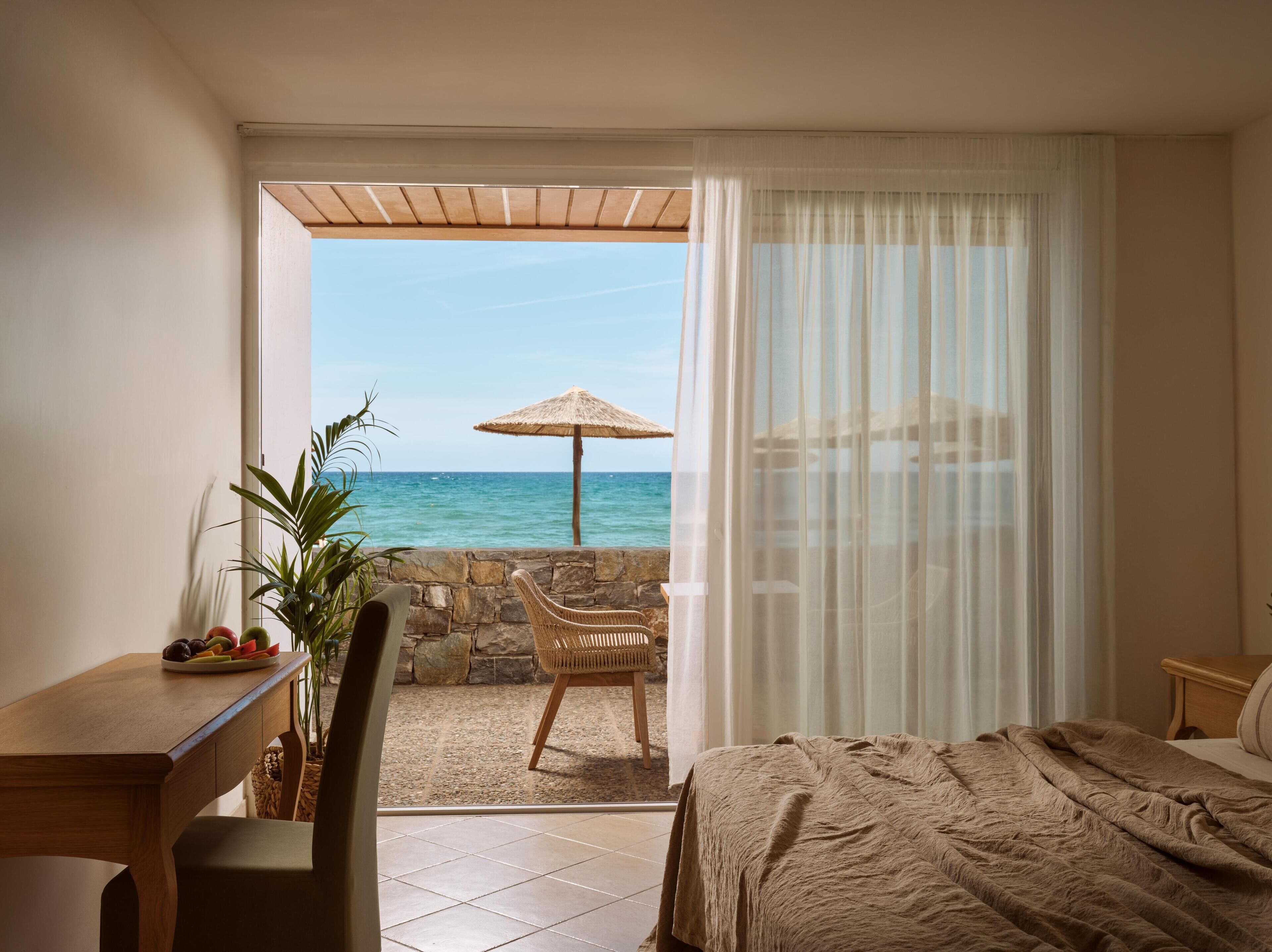 Premium Junior Suite Waterfront View, Ground floor | 1 bedroom, premium bedding, free minibar items, desk