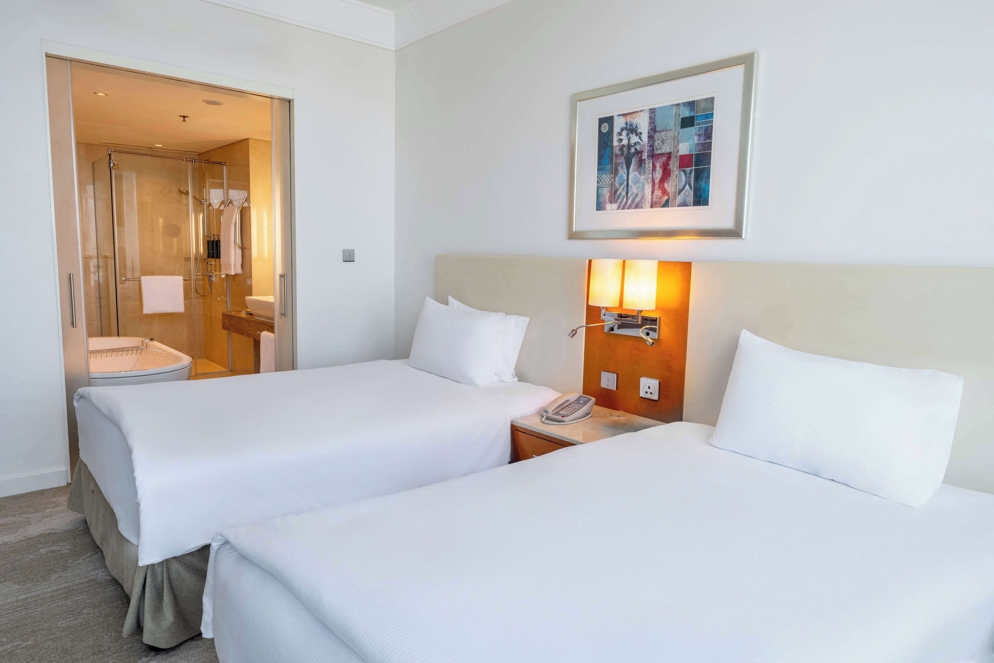 Frette Italian sheets, premium bedding, down comforters, minibar