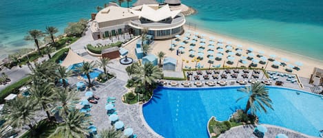 Outdoor pool, open 7:00 AM to 7:00 PM, pool cabanas (surcharge)