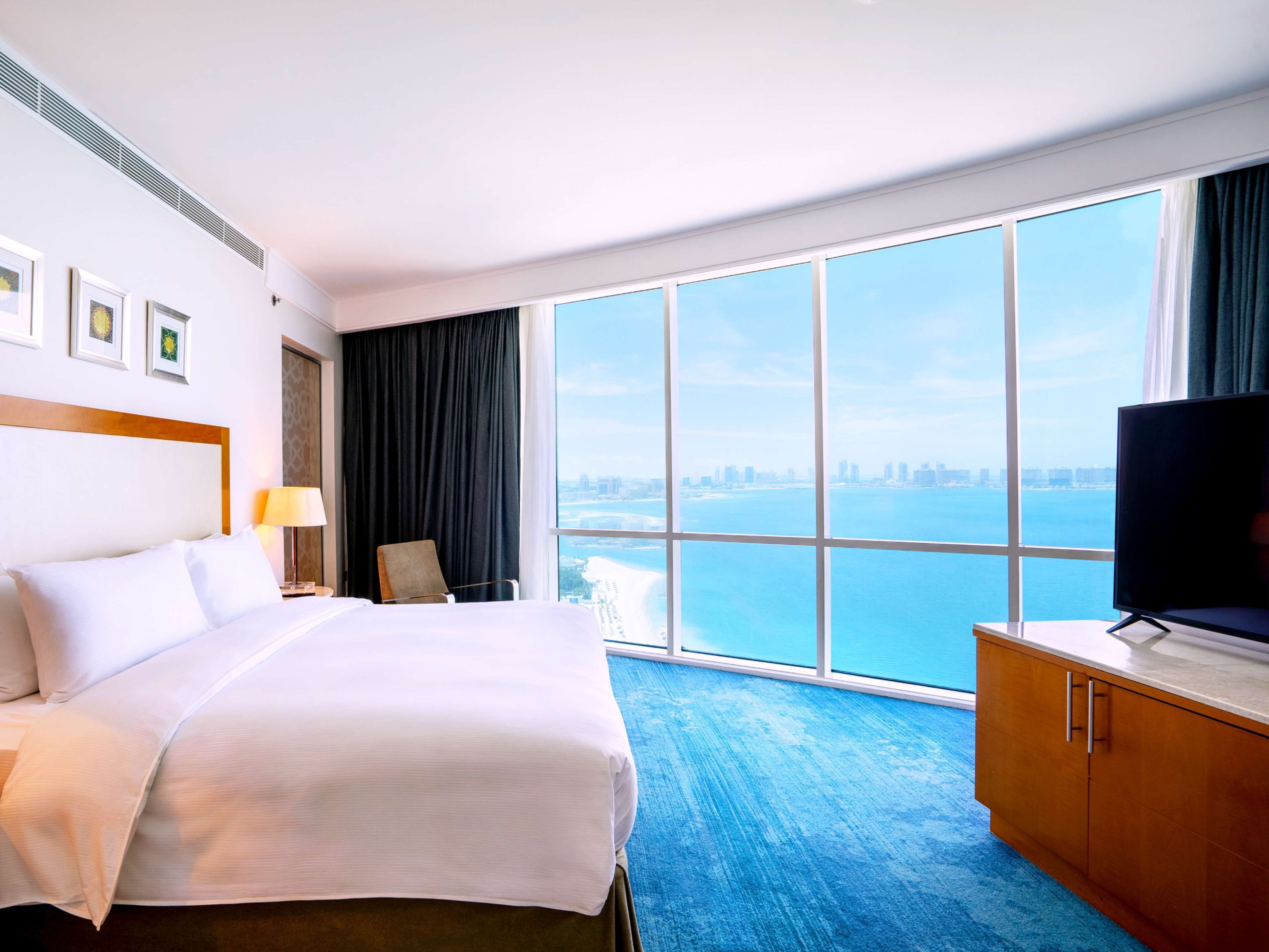 Frette Italian sheets, premium bedding, down comforters, minibar