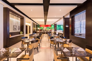Breakfast, lunch, dinner served; international cuisine