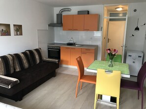 Standard Studio, Mountain View | Living room | LCD TV - Apartments Kaninska vas (Bovec)