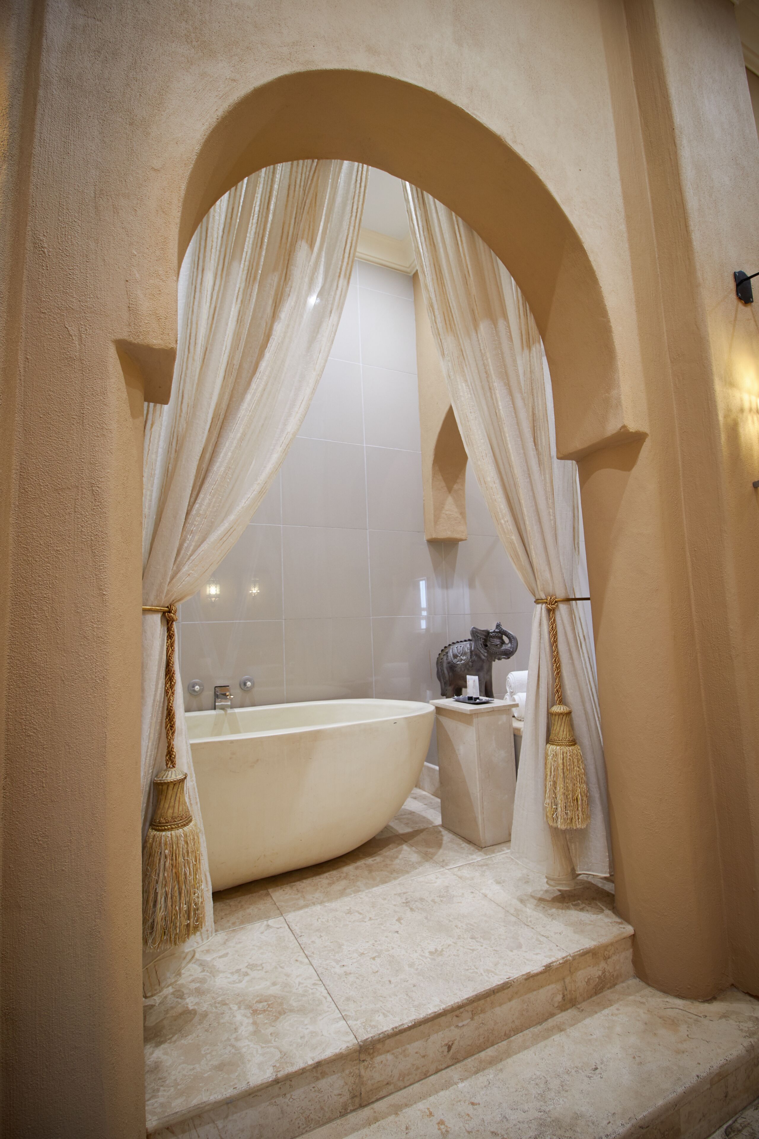 executive suite | bathroom | slippers, towels