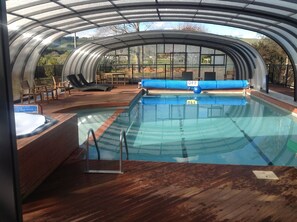 Indoor pool, outdoor pool, open 8:00 AM to 9:30 PM, pool loungers