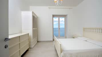 Family Apartment, 2 Bedrooms, Kitchen, Sea View | Down comforters, in-room safe, desk, laptop workspace