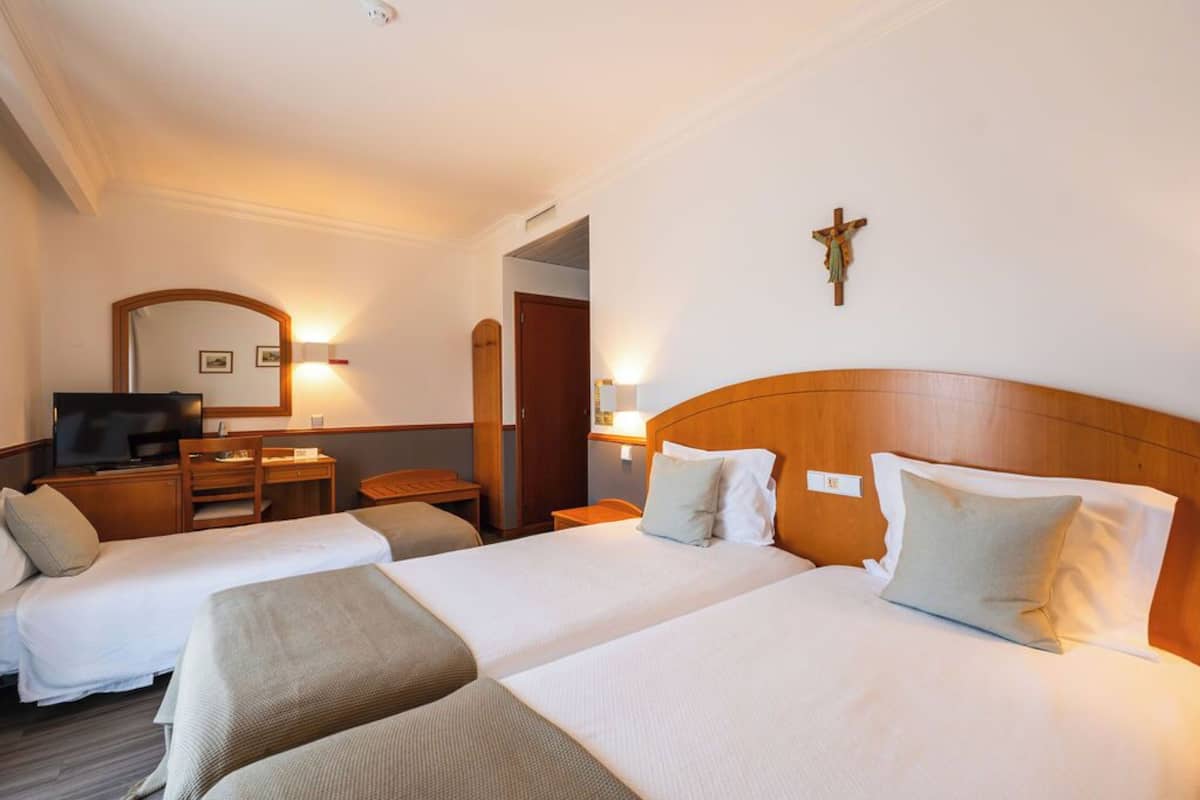 family triple room | 1 bedroom, in-room safe, desk, laptop workspace