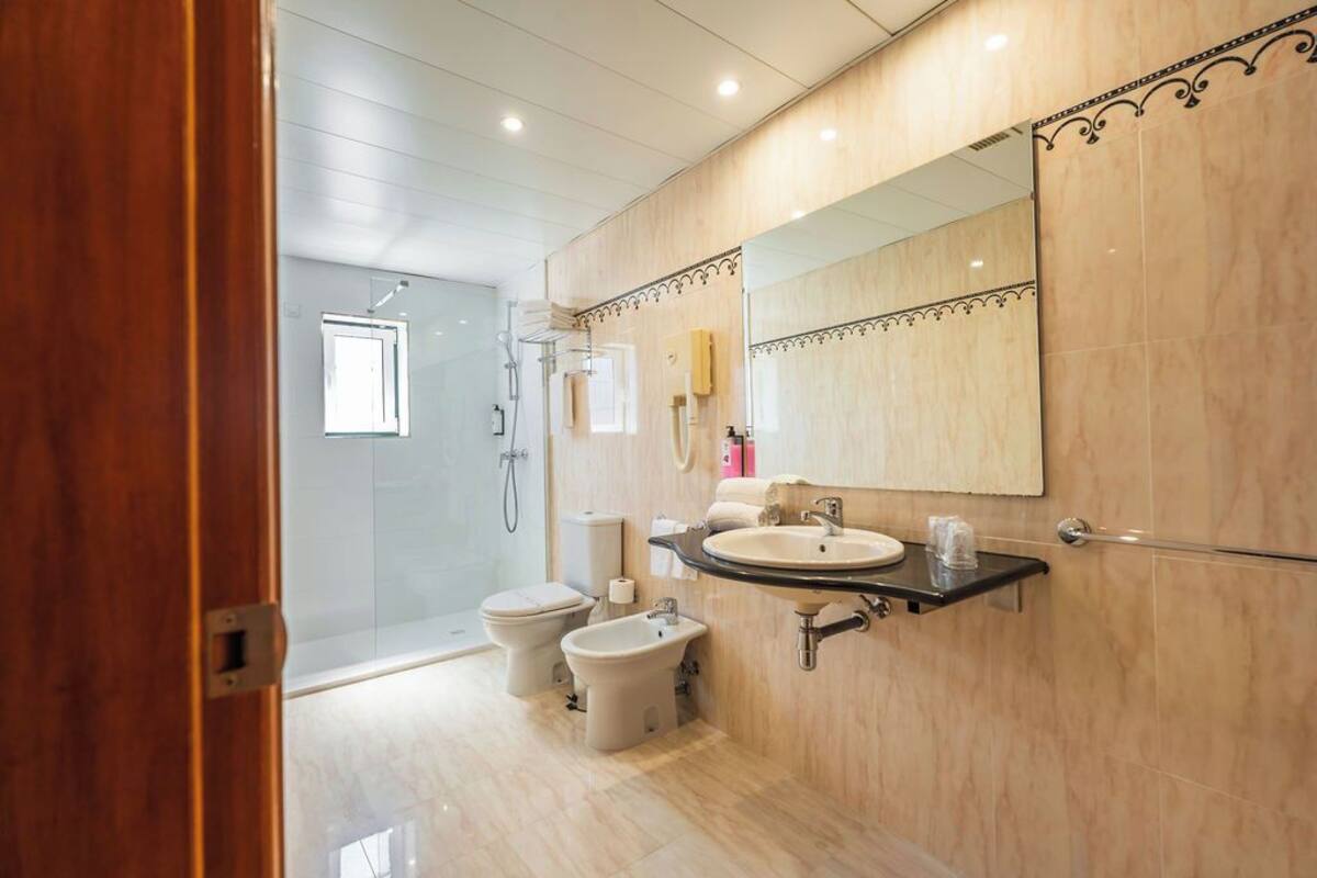 deep-soaking bathtub, free toiletries, hair dryer, bidet