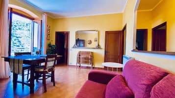 Panoramic Apartment, 2 Bedrooms, Balcony, Sea View | Living area | 32-inch LED TV with satellite channels, TV, iPod dock