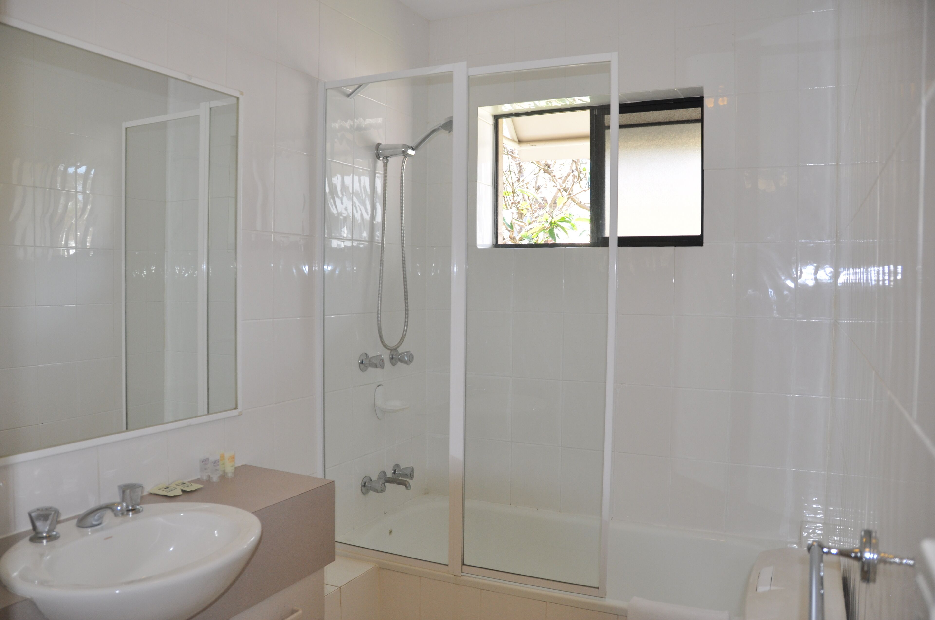 Rainfall showerhead, free toiletries, hair dryer, towels