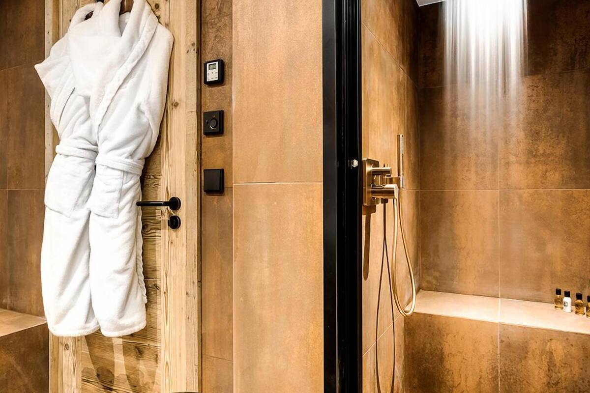 superior suite | bathroom | free toiletries, hair dryer, bathrobes, slippers