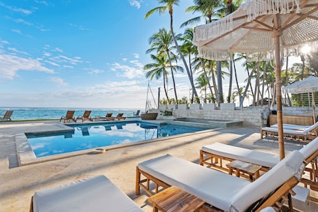 Outdoor pool. Watermark Luxury Oceanfront All Suite Hotel