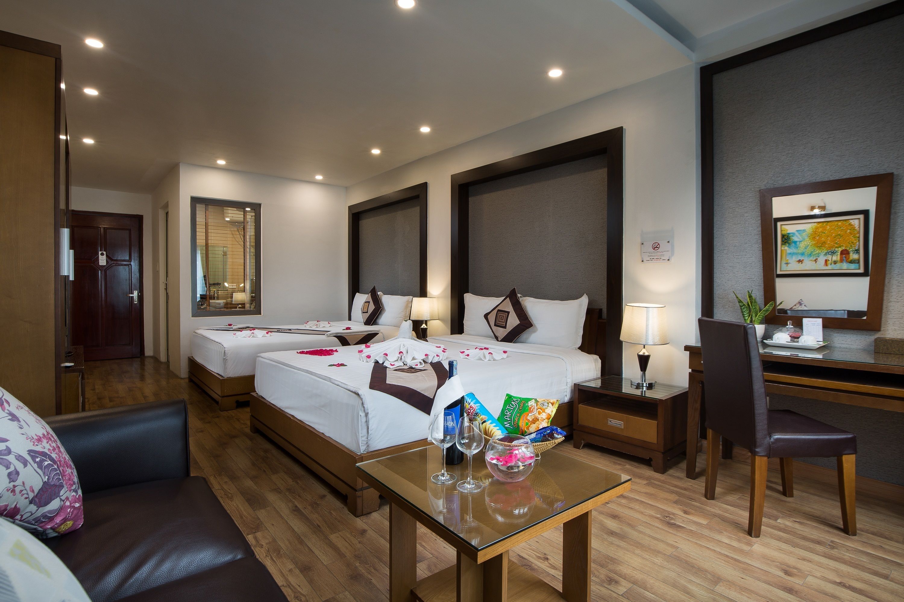 family room, 2 queen beds, city view | 1 bedroom, pillow-top beds, minibar, in-room safe