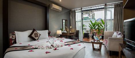 Colchones con pillow-top, minibar y caja de seguridad en la habitación