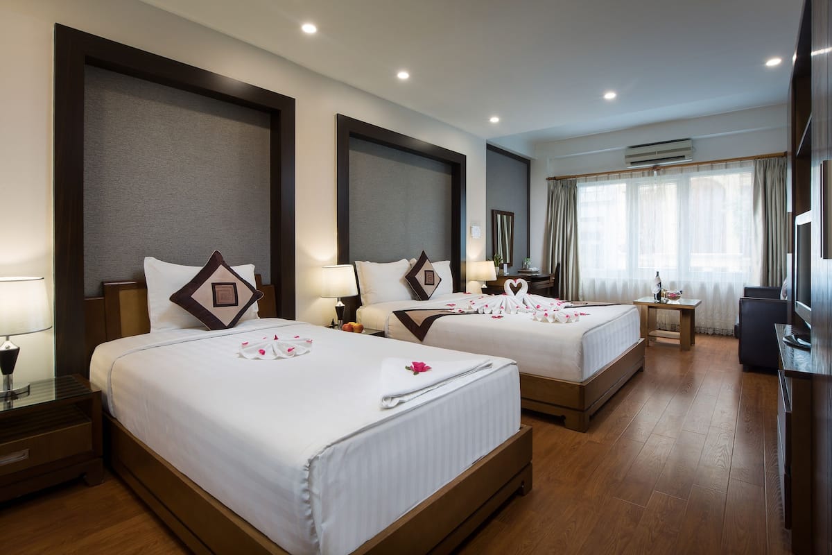 Suite, 1 Double 1 Single Bed and 1 Sofa, City View | Pillow-top beds, minibar, in-room safe, individually decorated