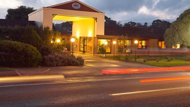 A hotel with a prominent MG logo, a covered entrance, and a well-lit facade. - Motel Mount Gambier (Mount Gambier)