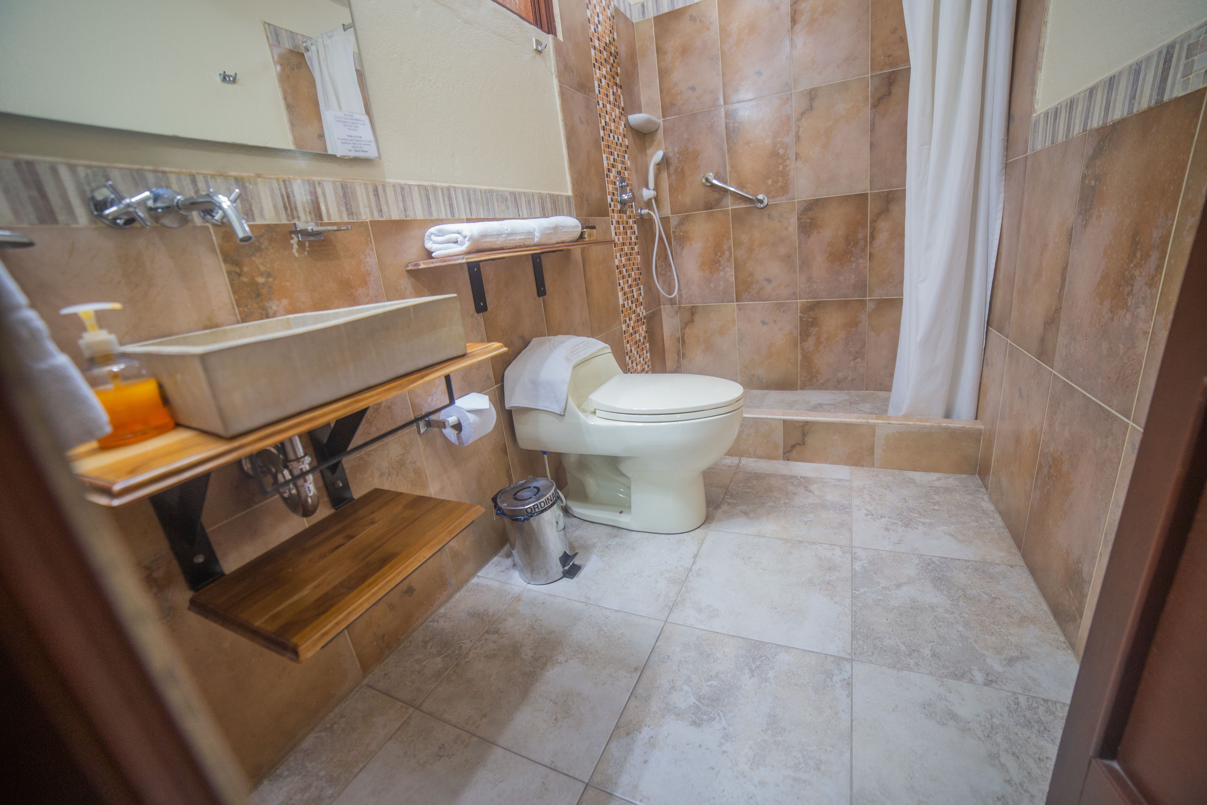 shower, rainfall showerhead, hair dryer, towels