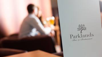 A menu for Parklands Bar & Restaurant with a tree logo.