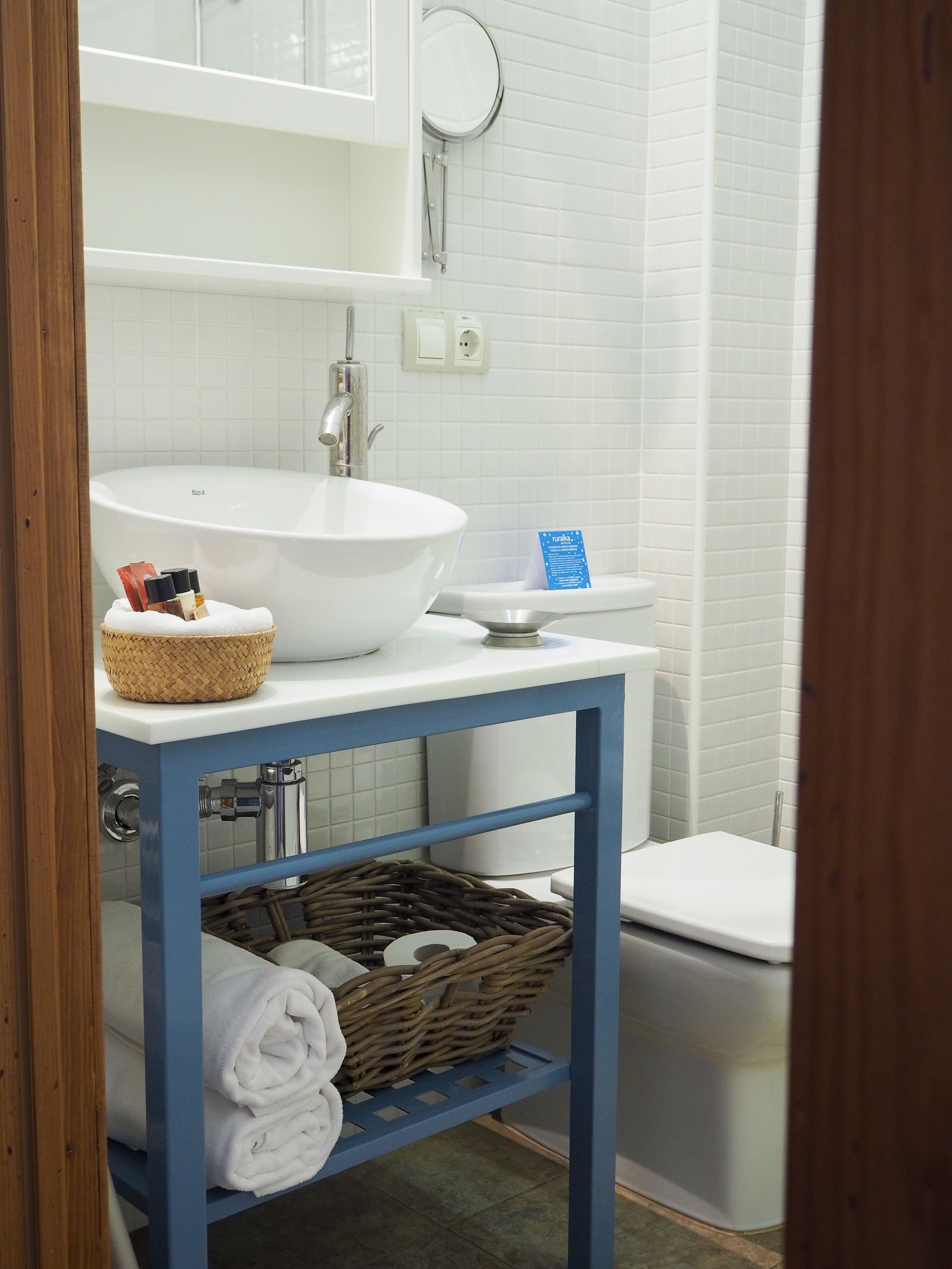 rainfall showerhead, hair dryer, towels, soap