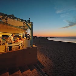 Breakfast, lunch, dinner served; Spanish cuisine, beach views